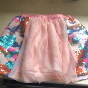 Skirt— worn once before we outgrew it.